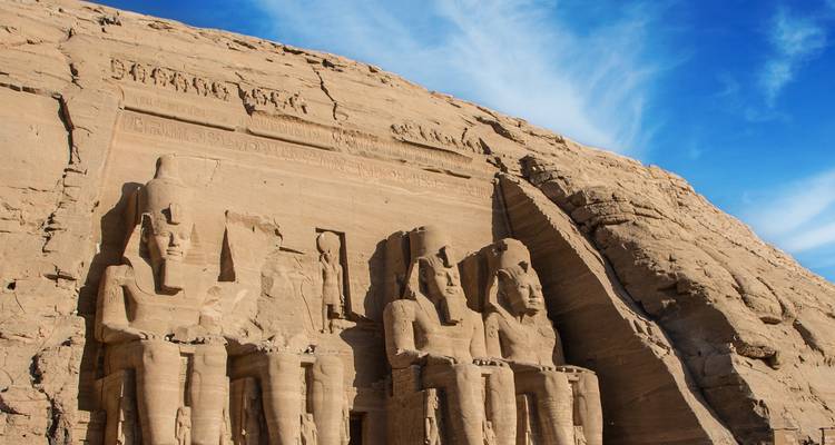 Prominent ancient temple structure carved into a cliff.