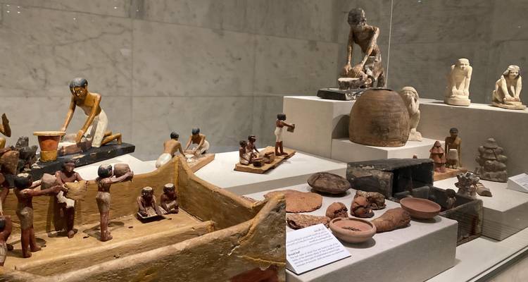 Museum display of ancient Egyptian artifacts.