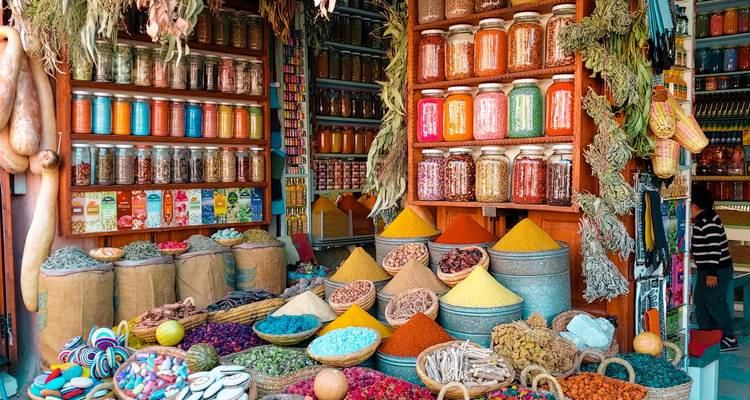 Spice shop with a wide variety of colorful spices on display.