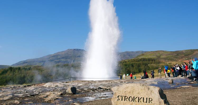 Geyser eruption in a geothermal area named Strokkur.