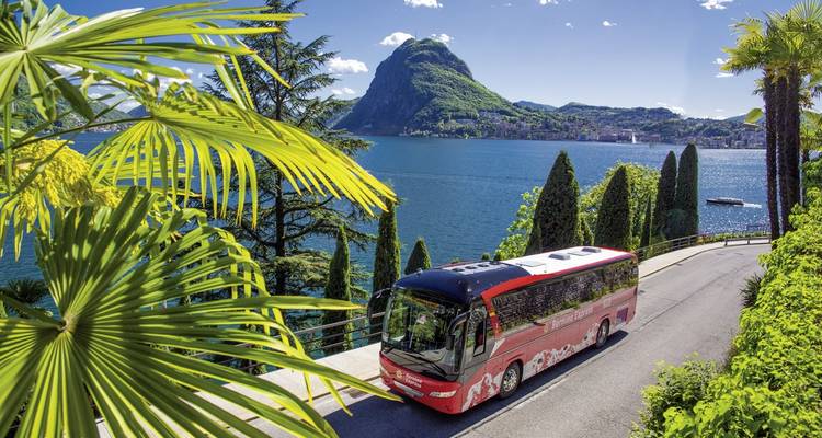 Scenic road by Lake Como with a bus and mountains.