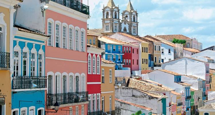 Colorful colonial buildings along a street.