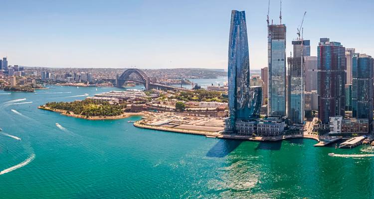 Horizonte de Sídney con el puerto y la Ópera de Sídney visibles.