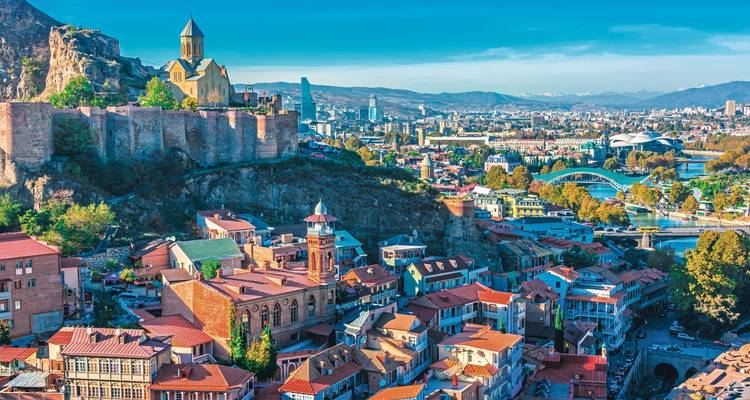 Panoramic view of a city with historic buildings and fortress