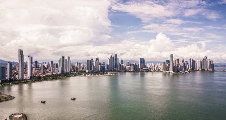 Aerial view of Panama City's waterfront skyline.