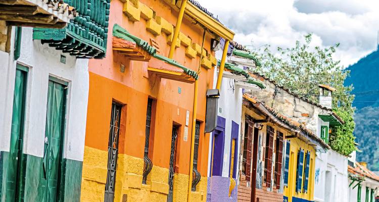 Colorful colonial buildings lining a street.