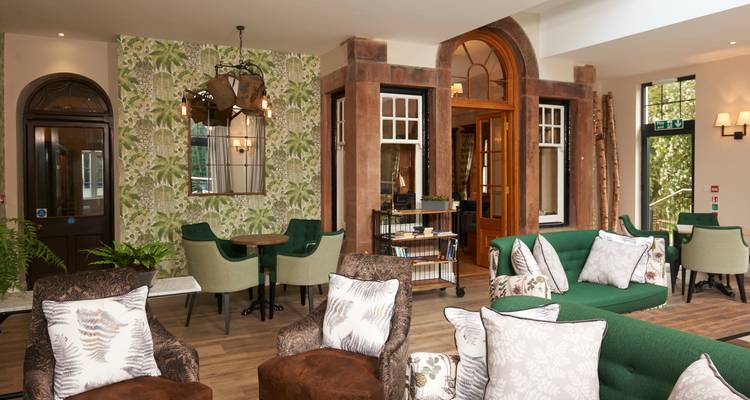 Stylish lounge area with elegant furnishings and decor.