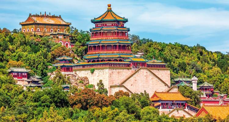 Beautiful hilltop palace set against a blue sky.