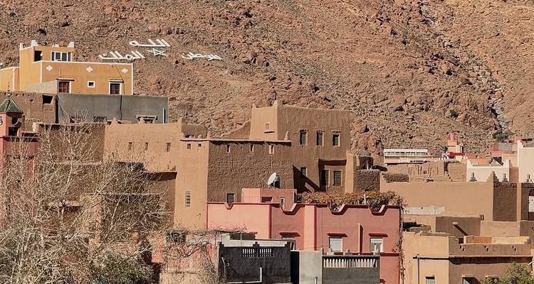 Traditional mud-brick buildings in a mountainous region.