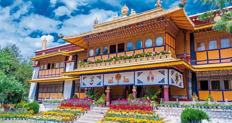 Brightly colored Tibetan palace decorated with flowers.
