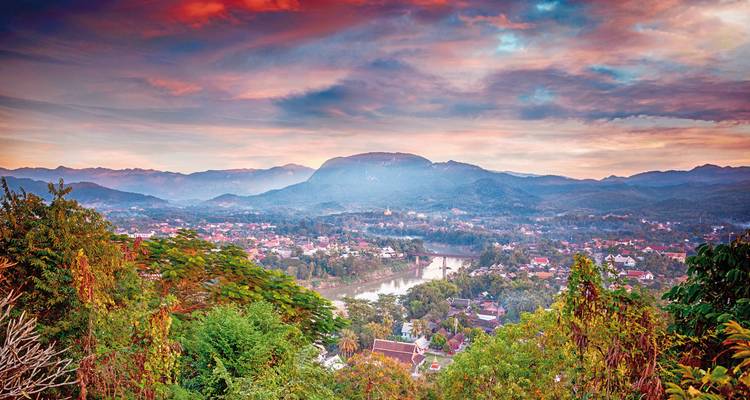 Panoramic view of Luang Prabang with colorful sky.