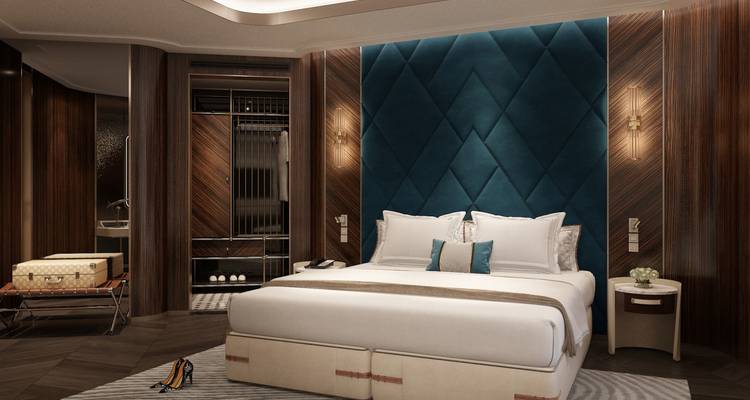 Cabine de luxe d'un bateau de croisière avec intérieurs en bois.