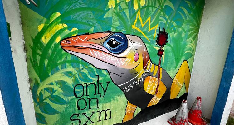 Colorful street art featuring a stylized lizard.