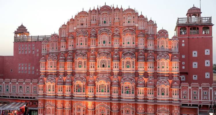 Colorful facade of a palace with many windows.