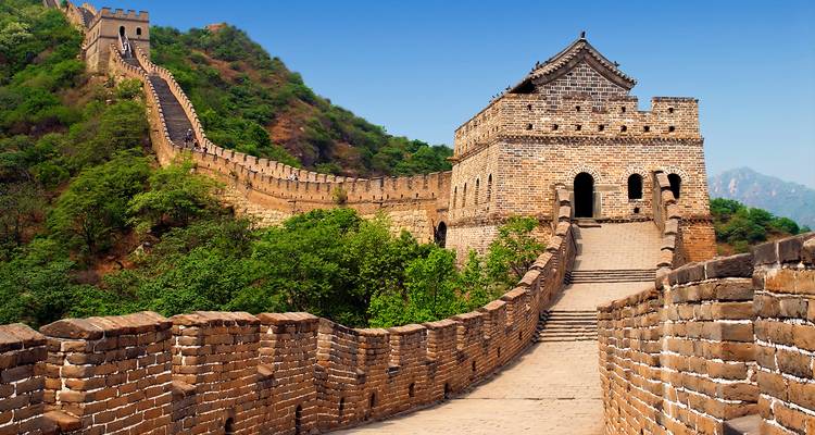 The Great Wall of China stretching across a mountainous landscape.