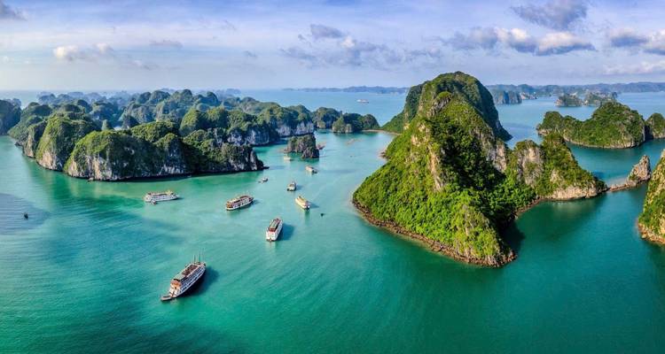 Stunning aerial view of Halong Bay with its iconic limestone islands.