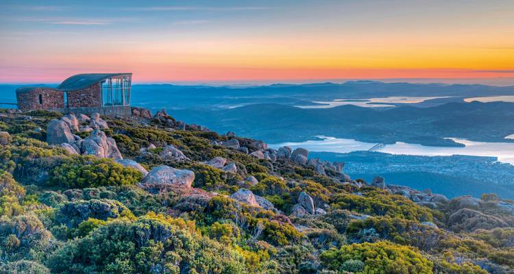 Hilltop observatory with panoramic views overlooking a city.