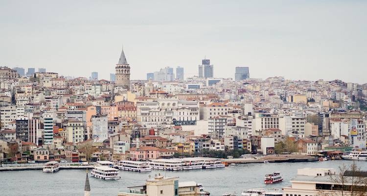 Cityscape with Galata Tower and river.