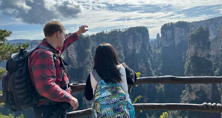 Tourists enjoying a view of Zhangjiajie rock formations