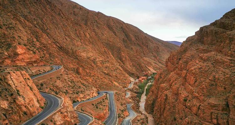 Winding road through rocky desert canyon
