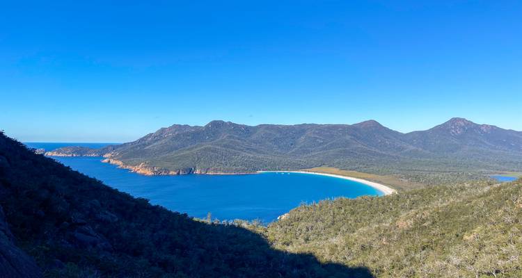 Beautiful bay with clear waters and mountain views.