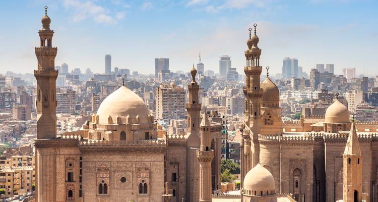 Cityscape of Cairo with historic mosques.