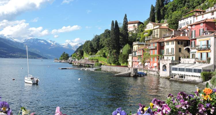 Charming lakeside village with colorful buildings.