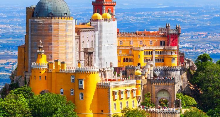 Colorful Pena Palace with scenic views of the surrounding landscape.
