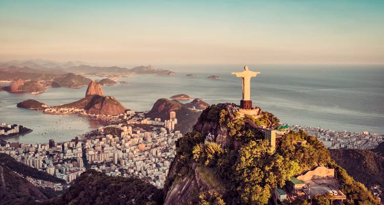 A panoramic view of Rio de Janeiro with Christ the Redeemer and beaches.