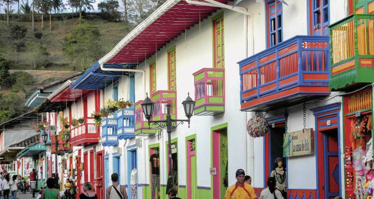 Colorful colonial-style buildings lining a street.