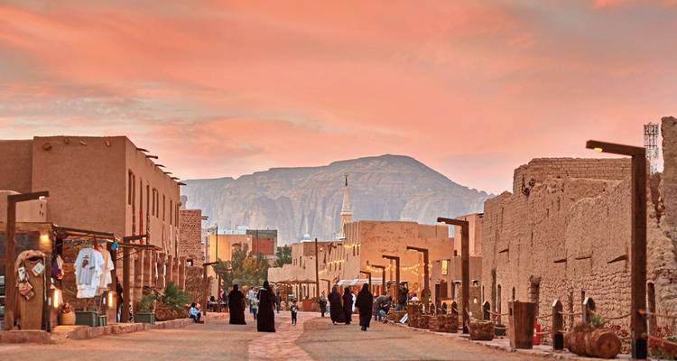Traditional Arabian street scene with colorful sky