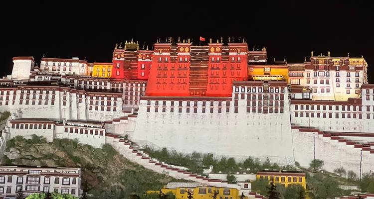 A large, brightly lit fortress with intricate architecture