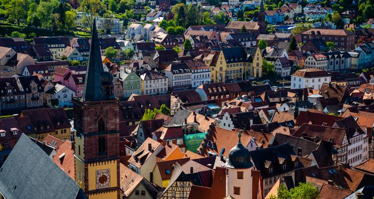 Aerial view of a city with traditional buildings.