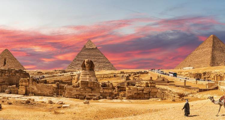 Giza Pyramids and Sphinx at sunset with camels