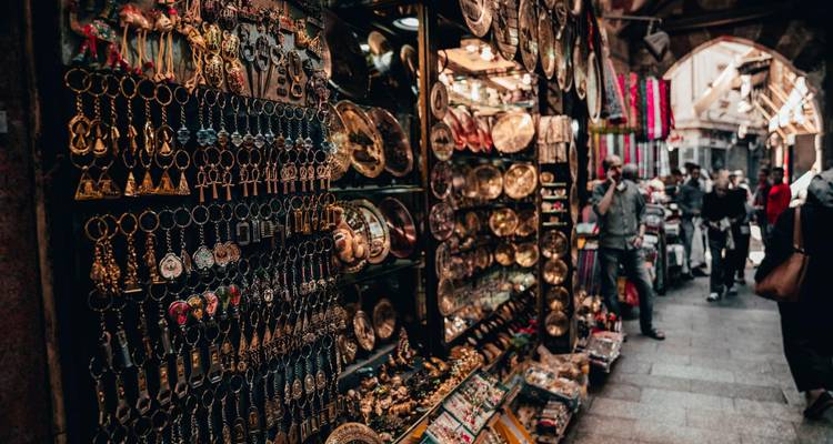 Market stall displaying various souvenirs.
