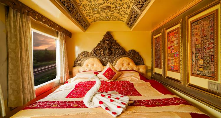 Tulip field by a canal with historic architecture in Amsterdam.