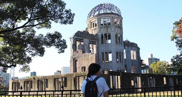 Person observing the Hiroshima Peace Memorial (Atomic Bomb Dome).