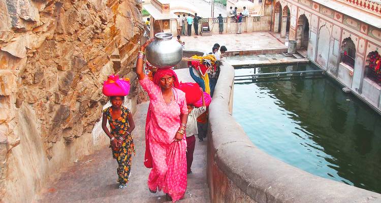 Traditional Indian scene with women carrying pots
