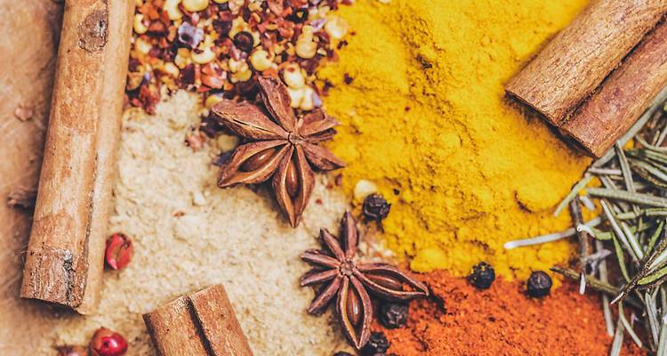 An assortment of colorful spices and herbs.
