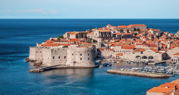 Overhead view of Dubrovnik's old town with distinctive stone walls.