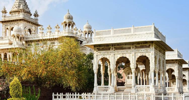 White marble structure with detailed carvings.