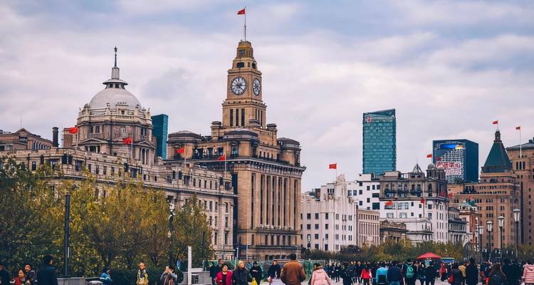 Urban street scene with historic and modern architecture.