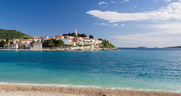 A scenic coastal village with Mediterranean architecture.