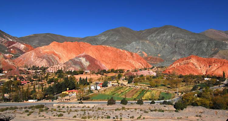 Panoramic view of multicolored hills and green valley, Purmamarca.