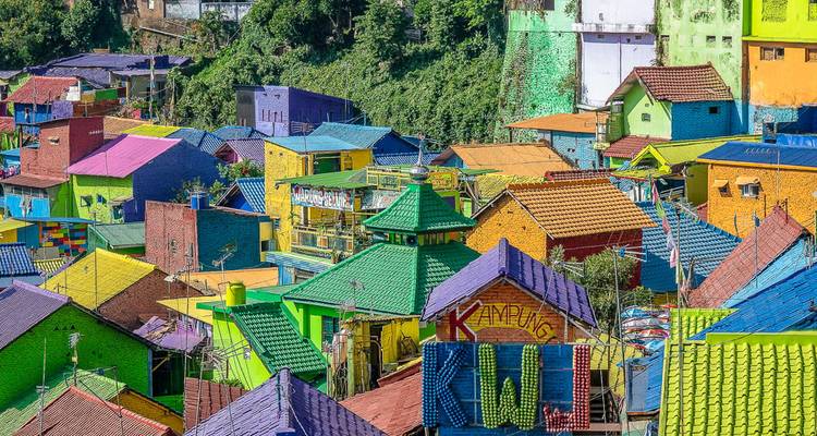 Colorful houses with vibrant roofs painted in a rainbow of colors.