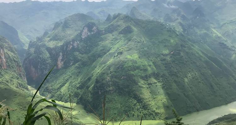 Mountainous landscape with lush greenery.