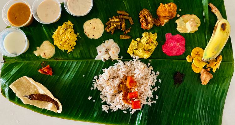 Traditional South Indian meal served on a banana leaf.