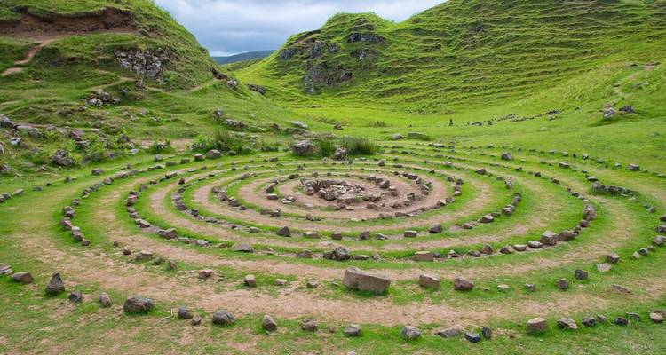 Fairy Glen with spiral patterns and lush green hills on the Isle of Skye.
