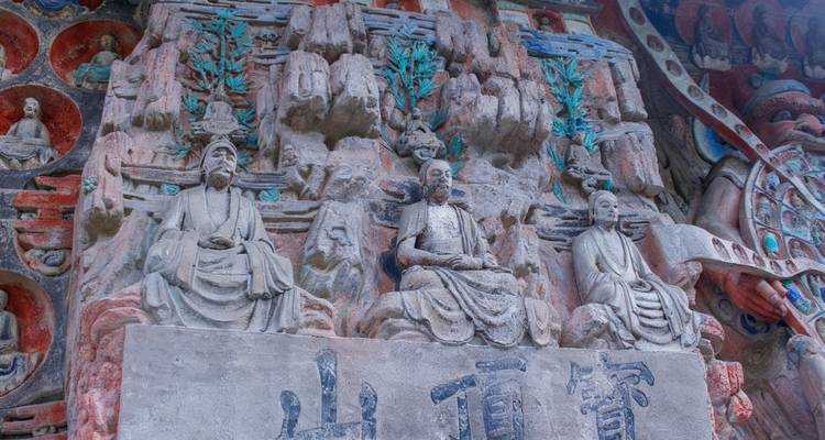 Stone-carved figures in a cultural site.