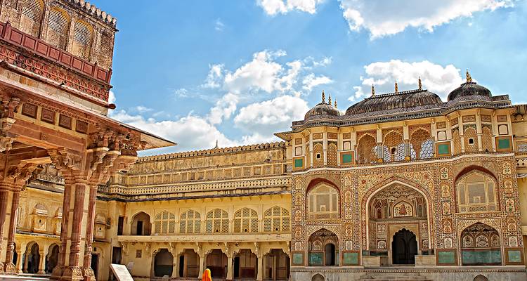 Intricately designed palace courtyard with vibrant decorations.